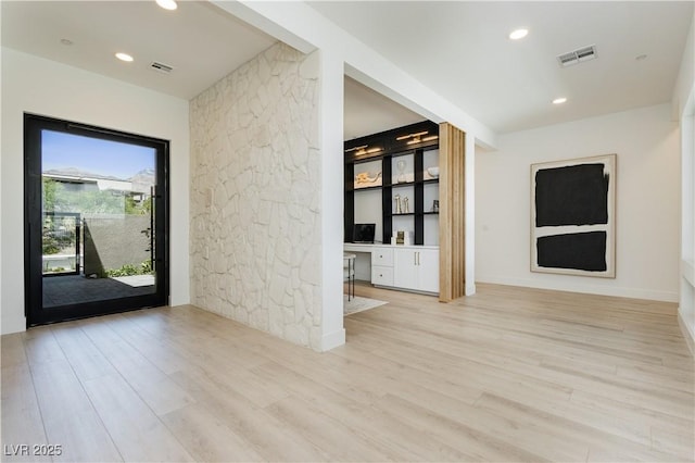 entryway with light wood-type flooring