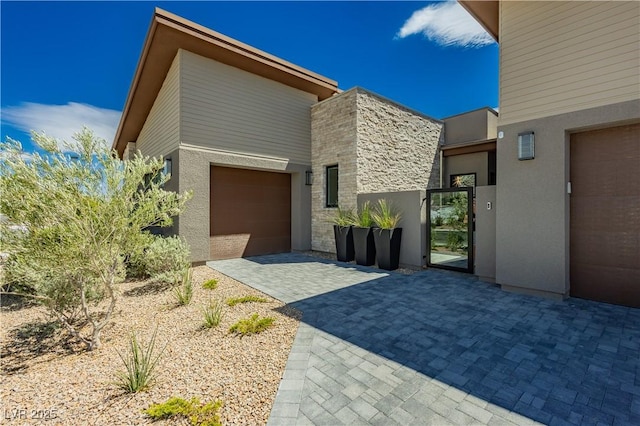 view of front of property with a garage