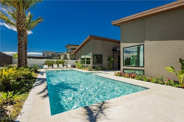 view of swimming pool featuring a patio