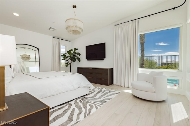 bedroom featuring light wood-type flooring