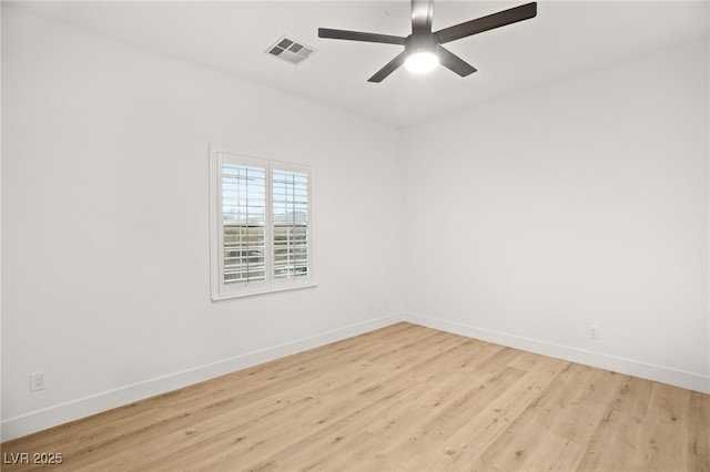 unfurnished room with ceiling fan and light hardwood / wood-style floors