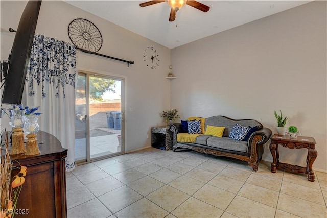 tiled living room with ceiling fan