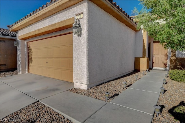 view of home's exterior featuring a garage