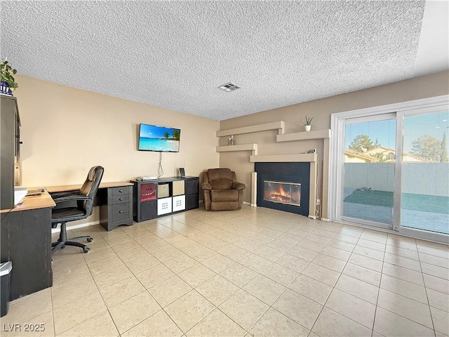 3350 Stacey Lyn Dr, Las Vegas, NV 89117 - tiled office space with a textured ceiling