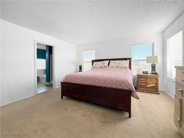 3350 Stacey Lyn Dr, Las Vegas, NV 89117 - bedroom with connected bathroom, light colored carpet, and multiple windows