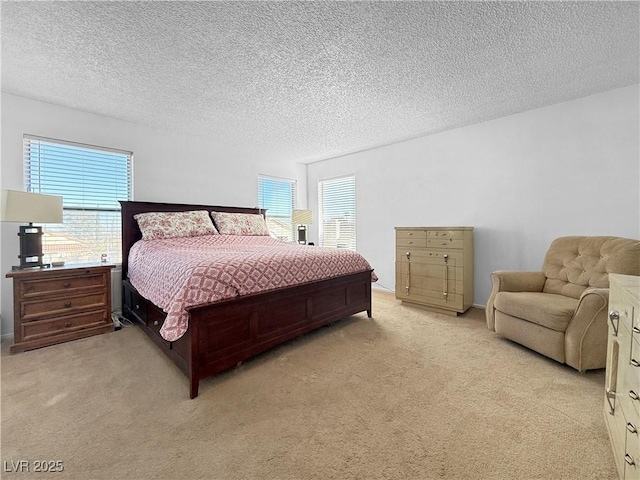 3350 Stacey Lyn Dr, Las Vegas, NV 89117 - bedroom with a textured ceiling, multiple windows, and light colored carpet