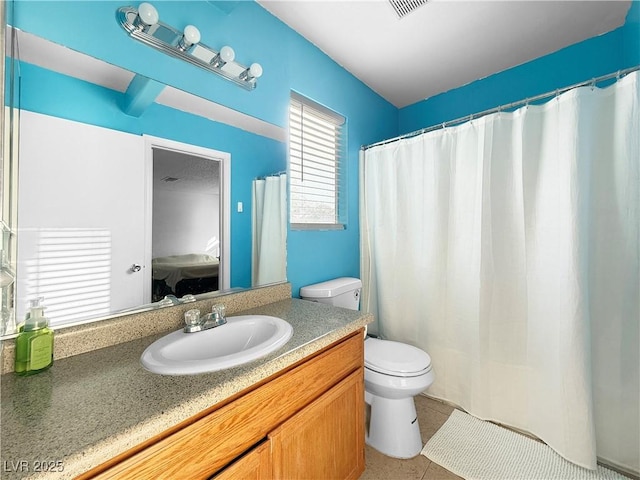 3350 Stacey Lyn Dr, Las Vegas, NV 89117 - bathroom with toilet, tile patterned flooring, and vanity