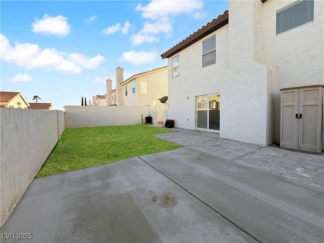 3350 Stacey Lyn Dr, Las Vegas, NV 89117 - rear view of house featuring a patio area and a lawn