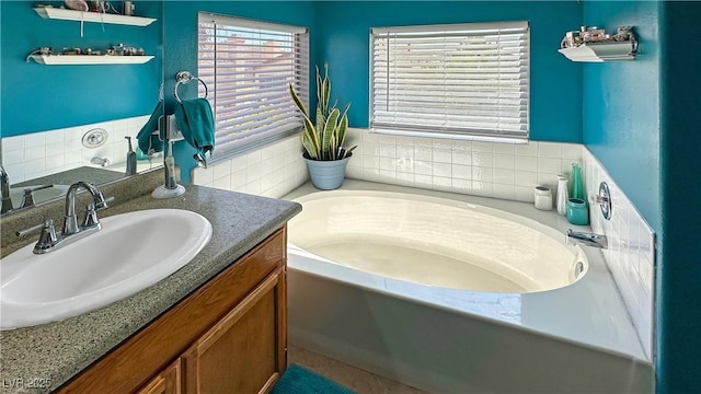 3350 Stacey Lyn Dr, Las Vegas, NV 89117 - bathroom featuring a tub to relax in and vanity