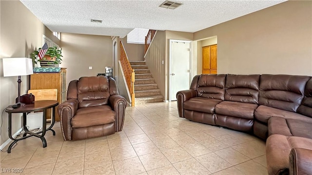 3350 Stacey Lyn Dr, Las Vegas, NV 89117 - tiled living room with a textured ceiling