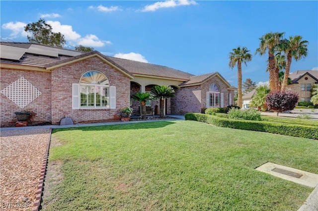 view of front facade with a front yard