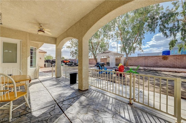 view of patio / terrace with ceiling fan