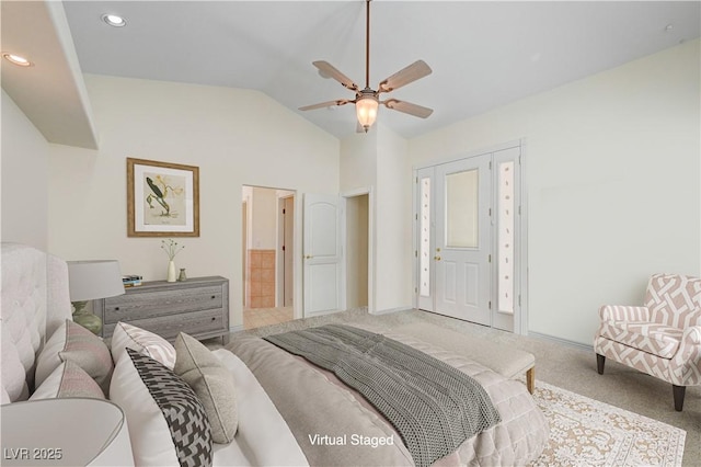 bedroom with carpet floors, vaulted ceiling, and ceiling fan