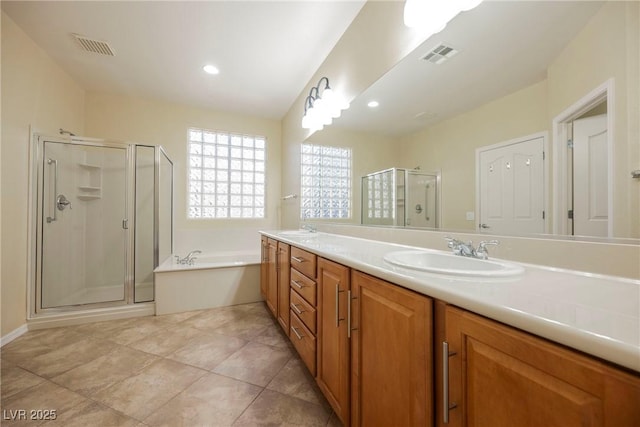 bathroom featuring vanity and plus walk in shower