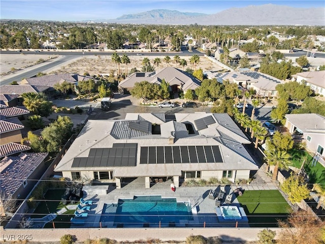 drone / aerial view featuring a mountain view