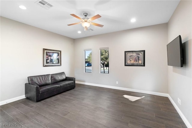 sitting room featuring ceiling fan