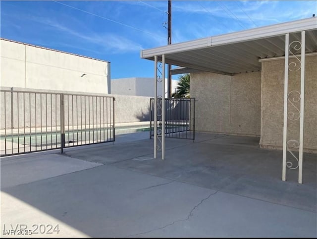 view of patio with a carport