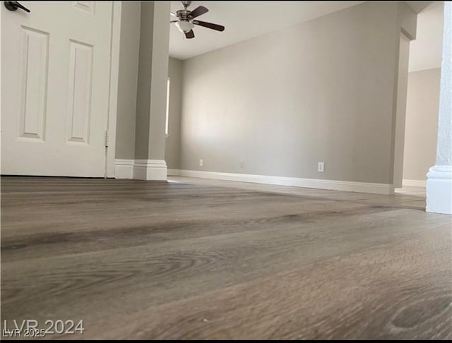 unfurnished room featuring ceiling fan and hardwood / wood-style floors