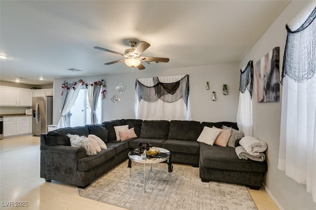 living room with ceiling fan