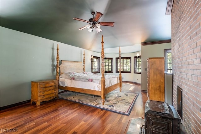 bedroom featuring ceiling fan and hardwood / wood-style flooring