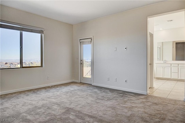 view of carpeted spare room