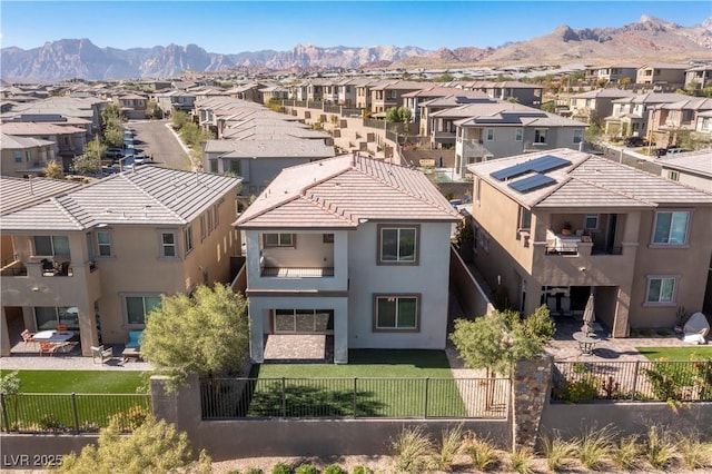 birds eye view of property featuring a mountain view