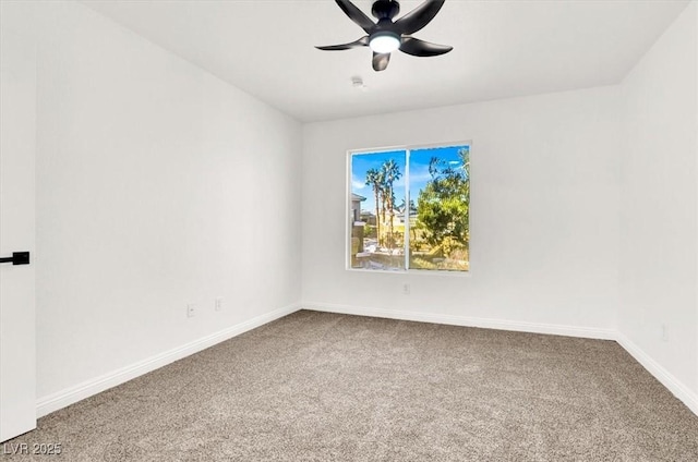 unfurnished room featuring carpet floors and ceiling fan