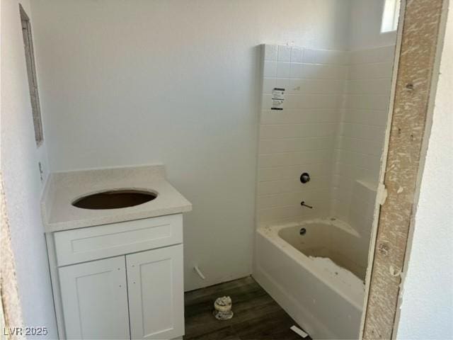 bathroom featuring wood-type flooring and vanity