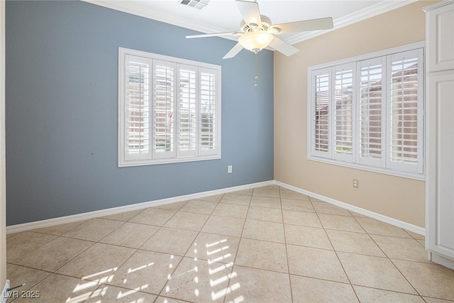 unfurnished room with ceiling fan, light tile patterned floors, and ornamental molding