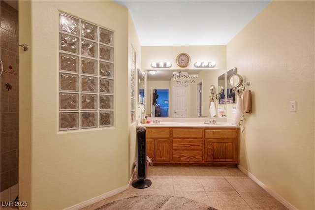 bathroom featuring vanity and tile patterned flooring