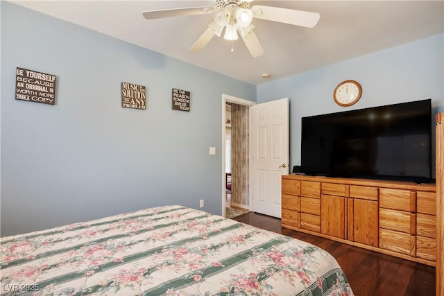 bedroom featuring ceiling fan and dark hardwood / wood-style floors