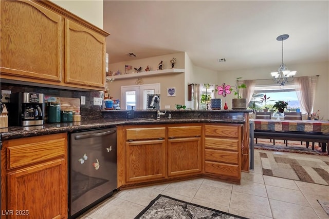 kitchen with light tile patterned floors, dishwasher, plenty of natural light, and a chandelier