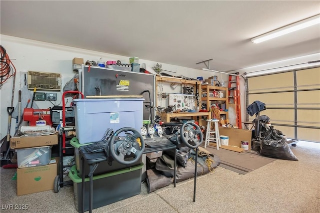 garage with a workshop area