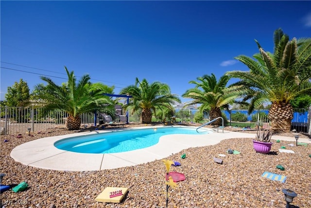 view of swimming pool featuring a patio