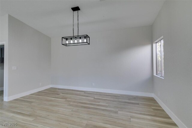 unfurnished dining area featuring light hardwood / wood-style floors