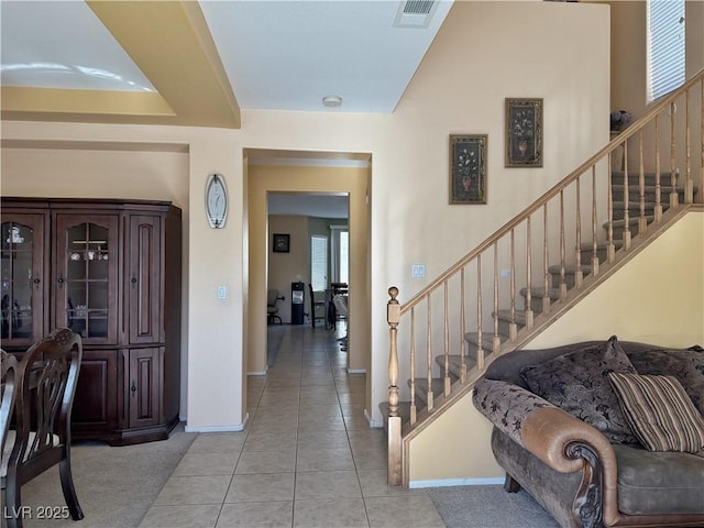 foyer entrance featuring light tile patterned floors