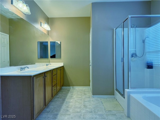 bathroom with shower with separate bathtub and vanity