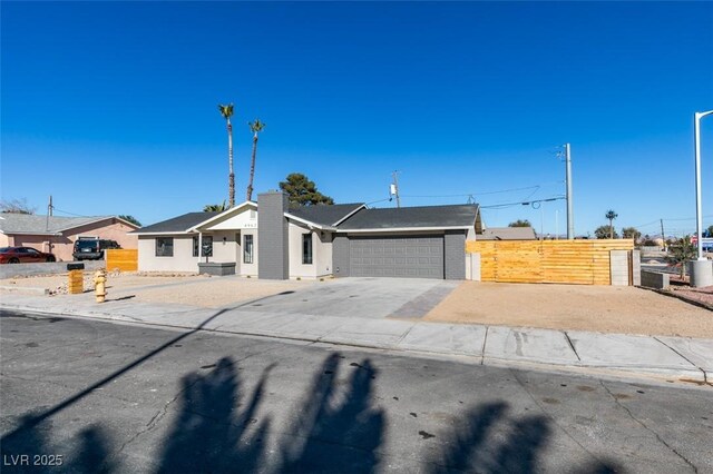 single story home with a garage