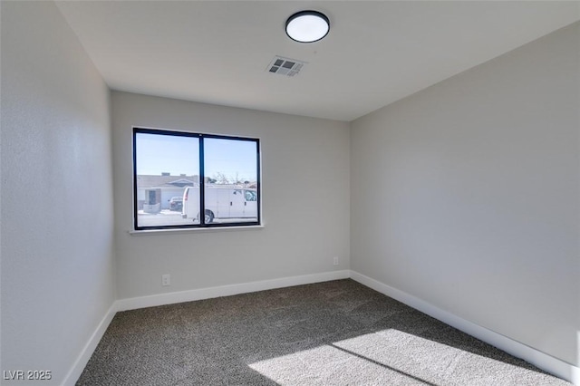 view of carpeted spare room