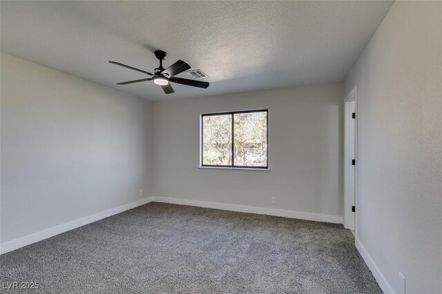 unfurnished room with carpet floors, ceiling fan, and a textured ceiling