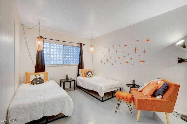 bedroom with concrete floors