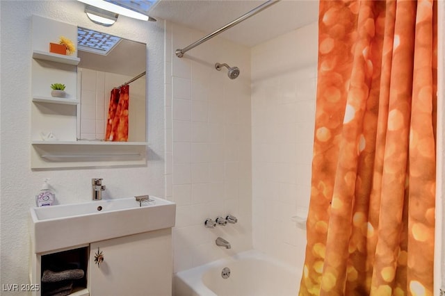 bathroom with vanity and shower / bath combo with shower curtain