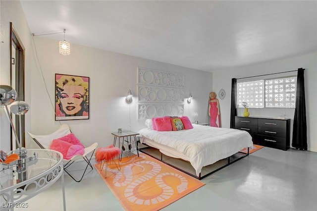 bedroom with concrete floors