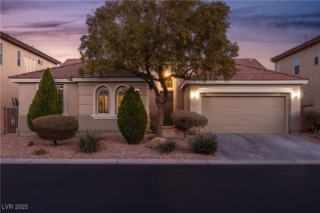 view of front of property featuring a garage