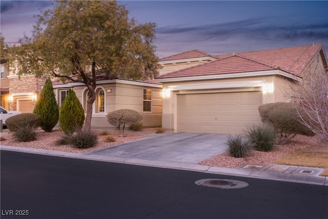 view of front of property with a garage