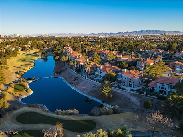 bird's eye view featuring a water and mountain view