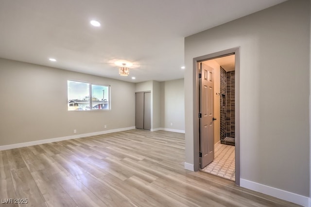 unfurnished room featuring light wood-type flooring