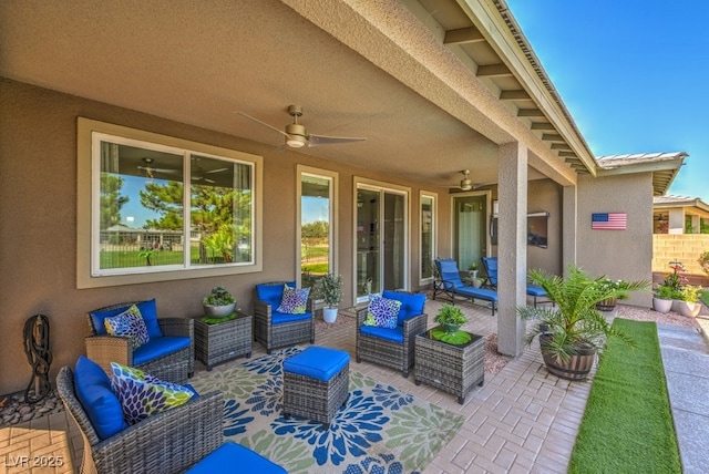 view of patio / terrace featuring ceiling fan and outdoor lounge area