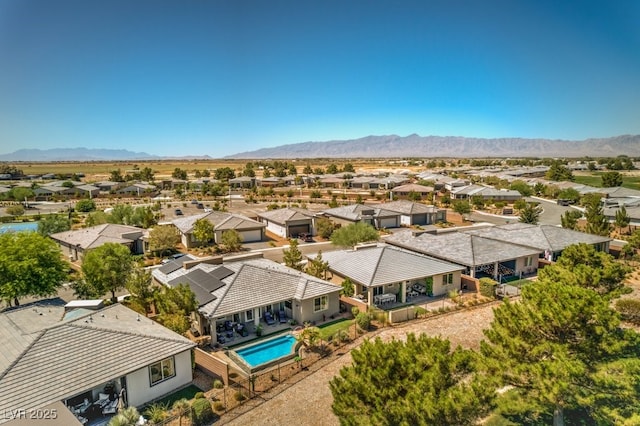 bird's eye view with a mountain view