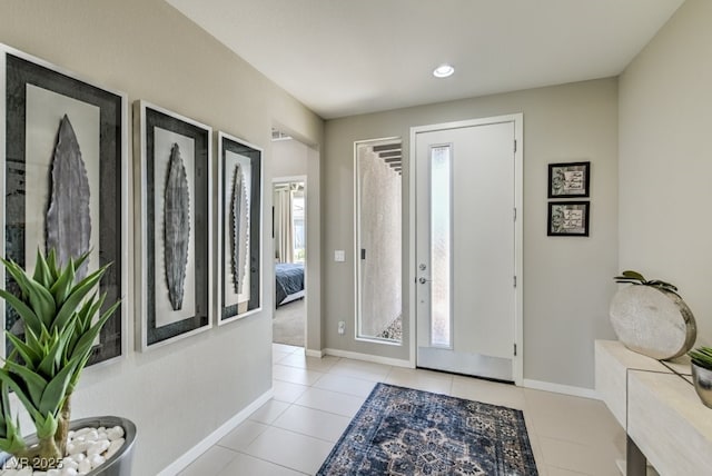 view of tiled foyer entrance